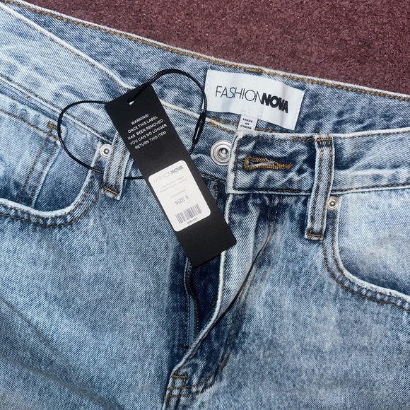 Light Wash Ripped Jeans - Picture 3 of 3